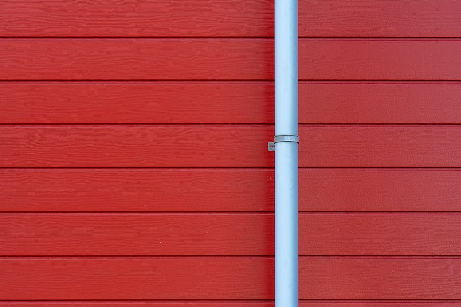 gutter and siding installers on a modern home exterior - gutter and siding installers